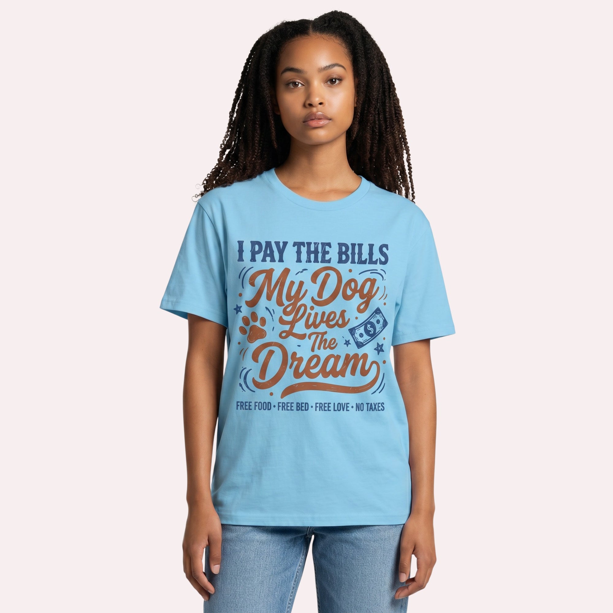 TrendyShift.Com light blue cotton graphic t-shirt with I Pay The Bills My Dog Lives The Dream text on a model
